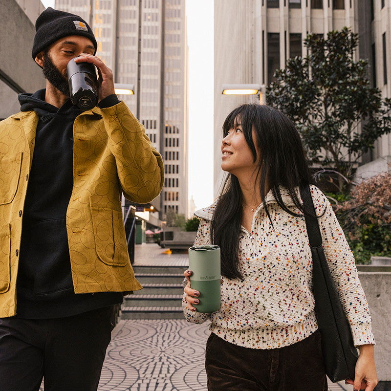 bring-your-own-party-kit-pints-and-tumblers-t2 16oz_rise_tumbler_black_iceberg_couple_drink_city_street_square.jpg