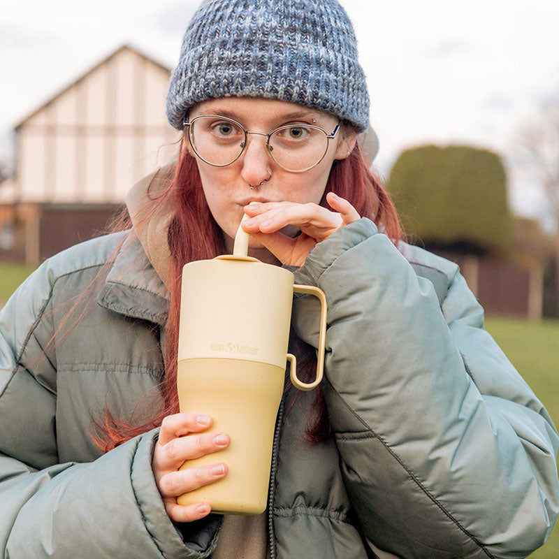 26oz-rise-tumbler-with-straw-lid-z8 26oz_rise_rumbler_straw_wax_yellow_woman_sip_square.jpg