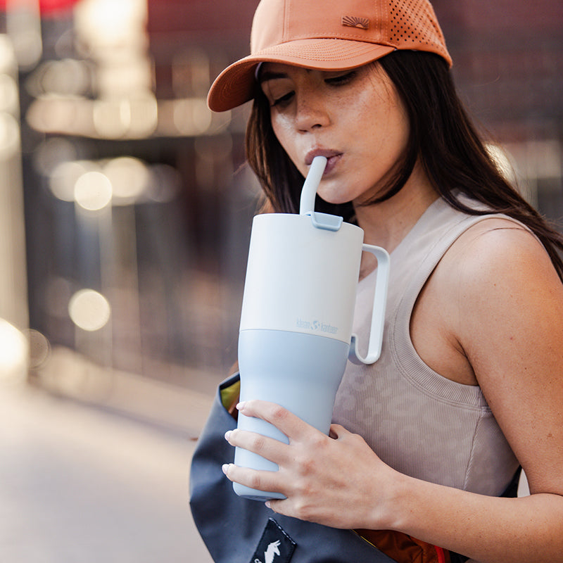 36oz-rise-tumbler-with-straw-lid-i0 36oz_rise_tumbler_straw_girl_sip_square.jpg