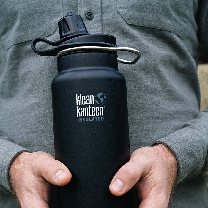 tkwide-chug-cap-s5 K32TKWSSL-SB-Craddled-Bottle_closeup_lifestyle.jpg