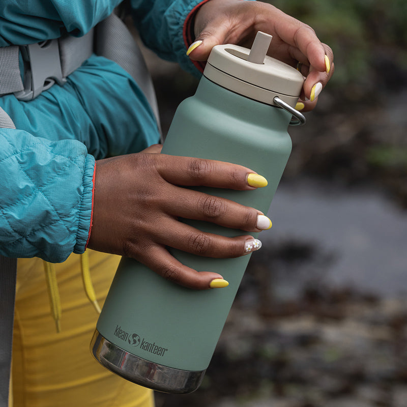 32oz-tkwide-made-to-do-more-bundle-d7 tkwide_32oz_insulated_bottle_twist_closeup_seapsray_hand_square.jpg