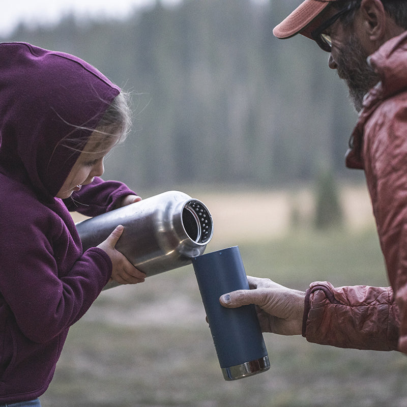 64oz-tkwide-with-loop-cap-u2 tkwide_64oz_bottle_girl_dad_filling_square.jpg